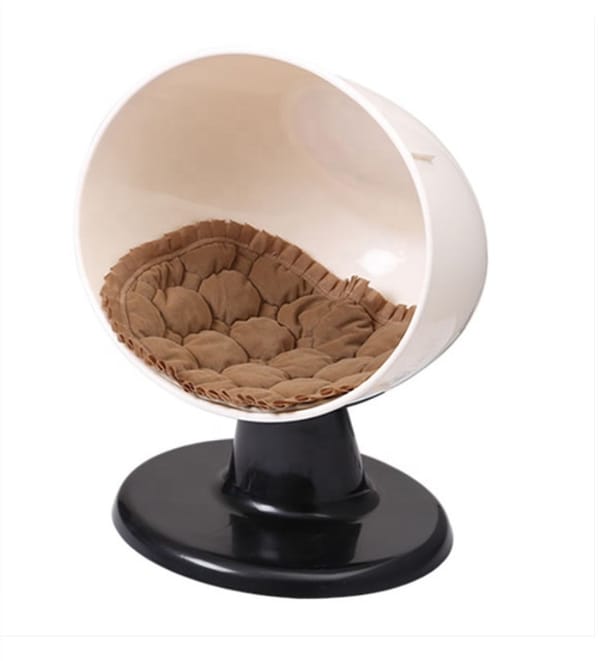 Beige hooded cave bed for cats and small dogs.