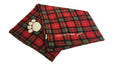 Folded red tartan fleece dog blanket with an embroidered paw and Hamish McBeth branding.