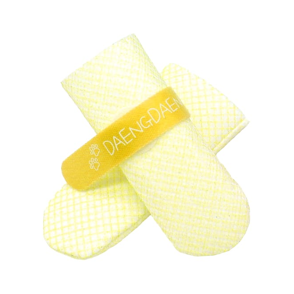 Original yellow Daeng Daeng disposable dog shoes on white; size Medium, sold as 28 pieces. Representative shoes shown, not all 28 pieces.